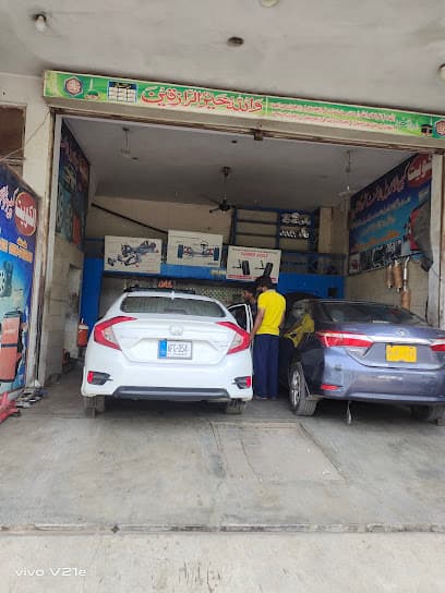 Alkuwait Wheel Alignment center — verified car workshop in Faisalabad, Faisalabad, Pakistan