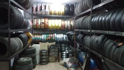 Al-Madni Wheel Alignment & Tyre Shop — verified car workshop in Gulistan E Johar, Karachi, Pakistan